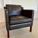 Mid-century Stouby leather lounge chair and stool in brown leather