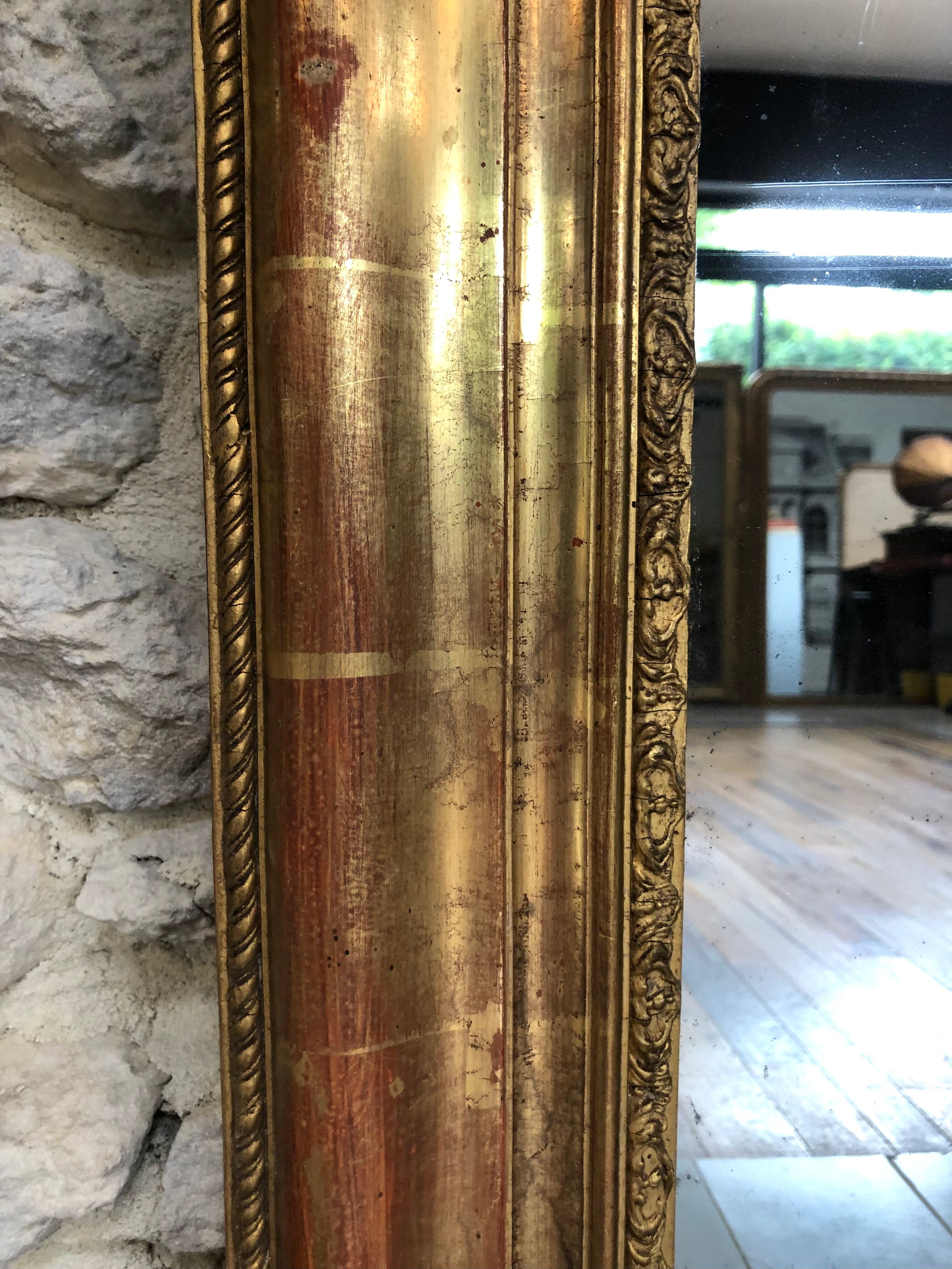 Mirror Louis-Philippe floral decoration period 19th gilded with gold leaf 102cm / 77,5cm