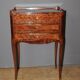Pair of Louis XV style bedside tables in marquetry, 20th century.