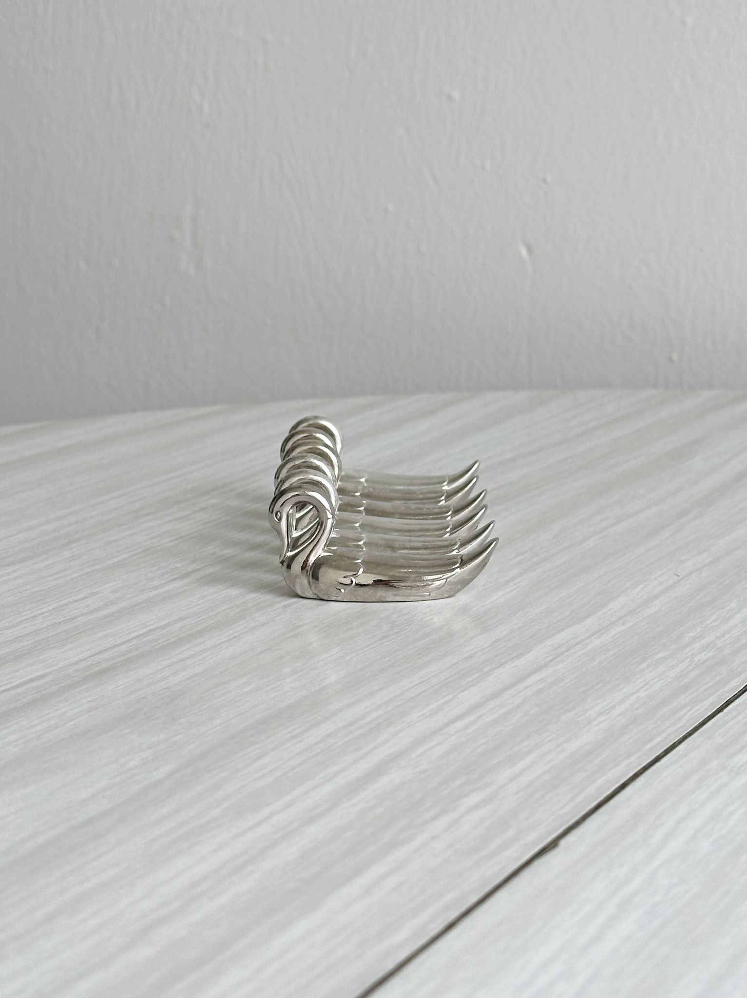 set of 6 metal knife holders in the shape of a swan,