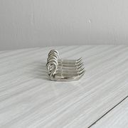set of 6 metal knife holders in the shape of a swan,