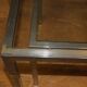 Coffee table and its steel and glass wiggles around 1970