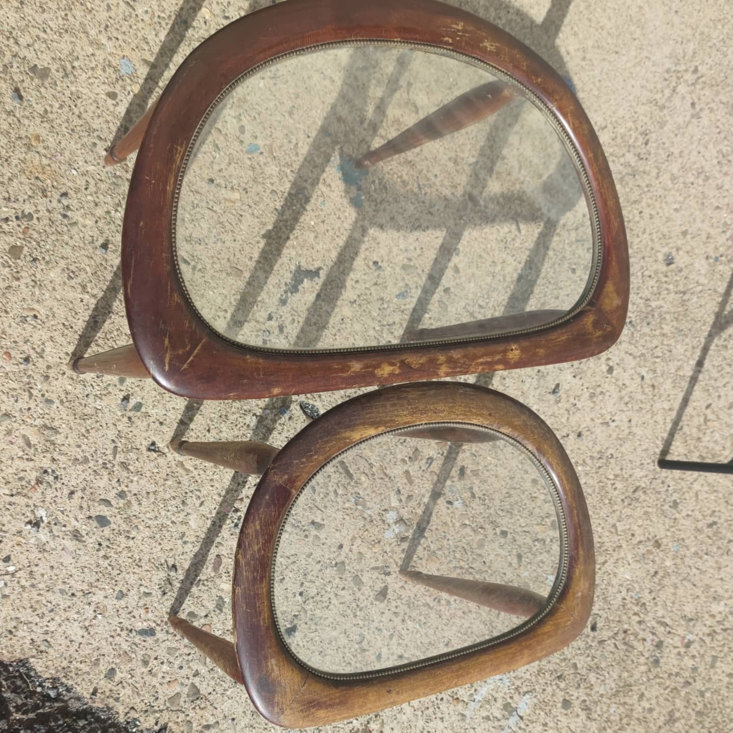 2 tables in mahogany, glass and bronze, circa 1960