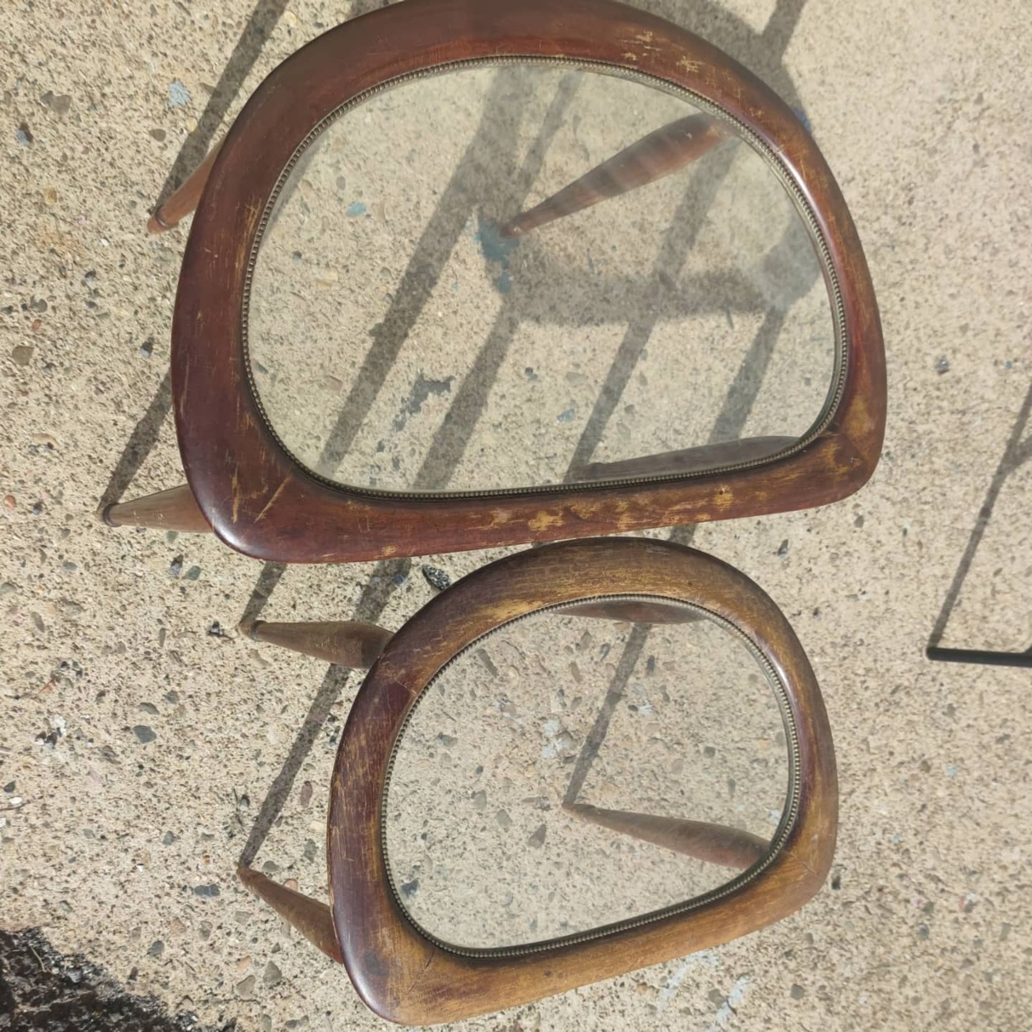 2 tables in mahogany, glass and bronze, circa 1960