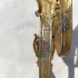 Old curtain kiss in gilded bronze