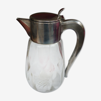 Pitcher refreshing glass and silver metal