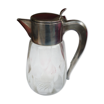 Pitcher refreshing glass and silver metal