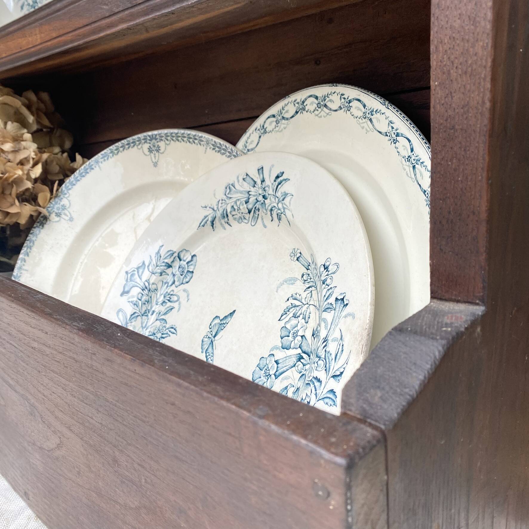 Antique wooden plate rack cupboard.
