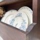 Antique wooden plate rack cupboard.
