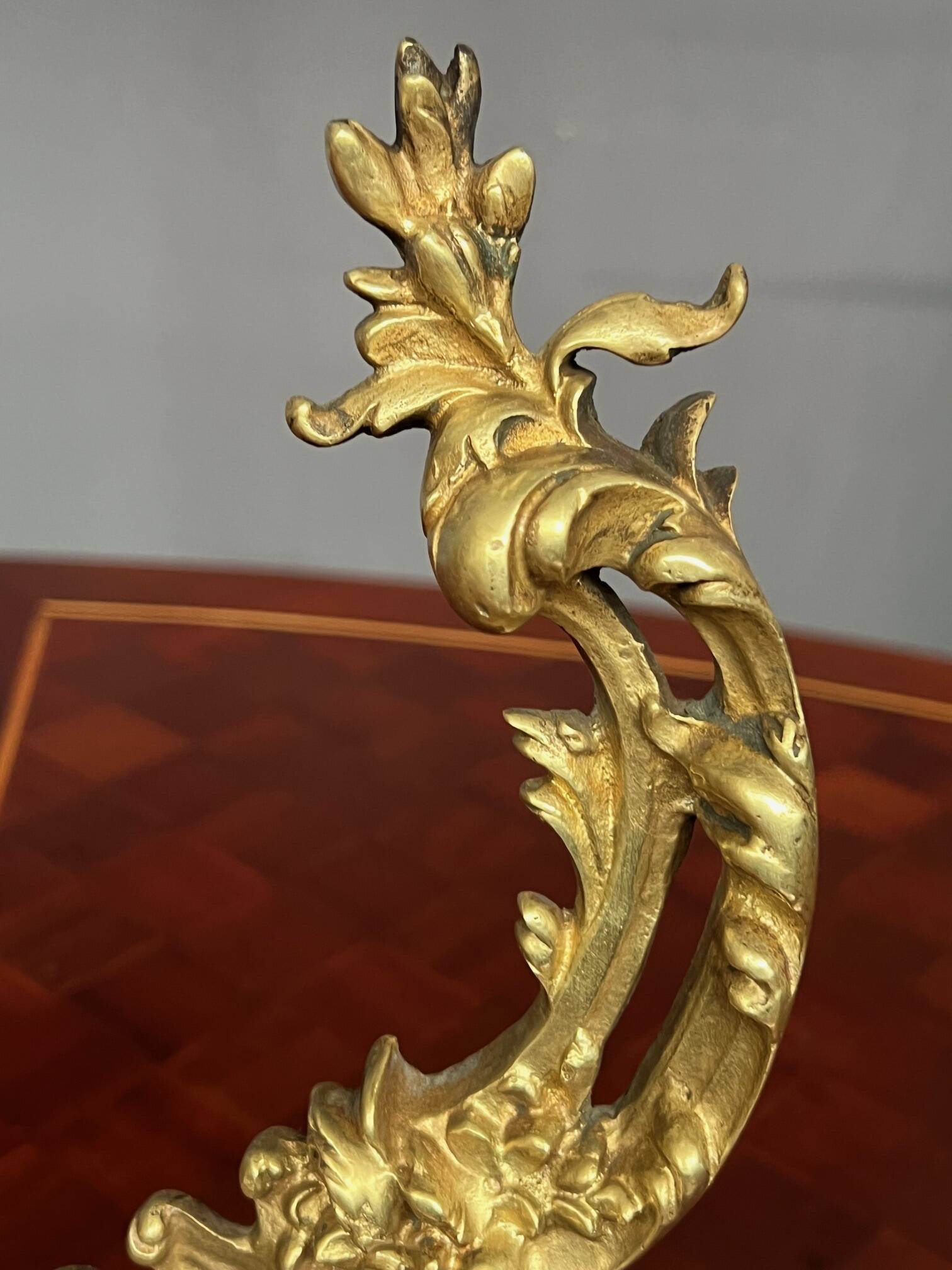 Massive gilded bronze fireplace decoration in Rococo style.