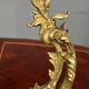 Massive gilded bronze fireplace decoration in Rococo style.