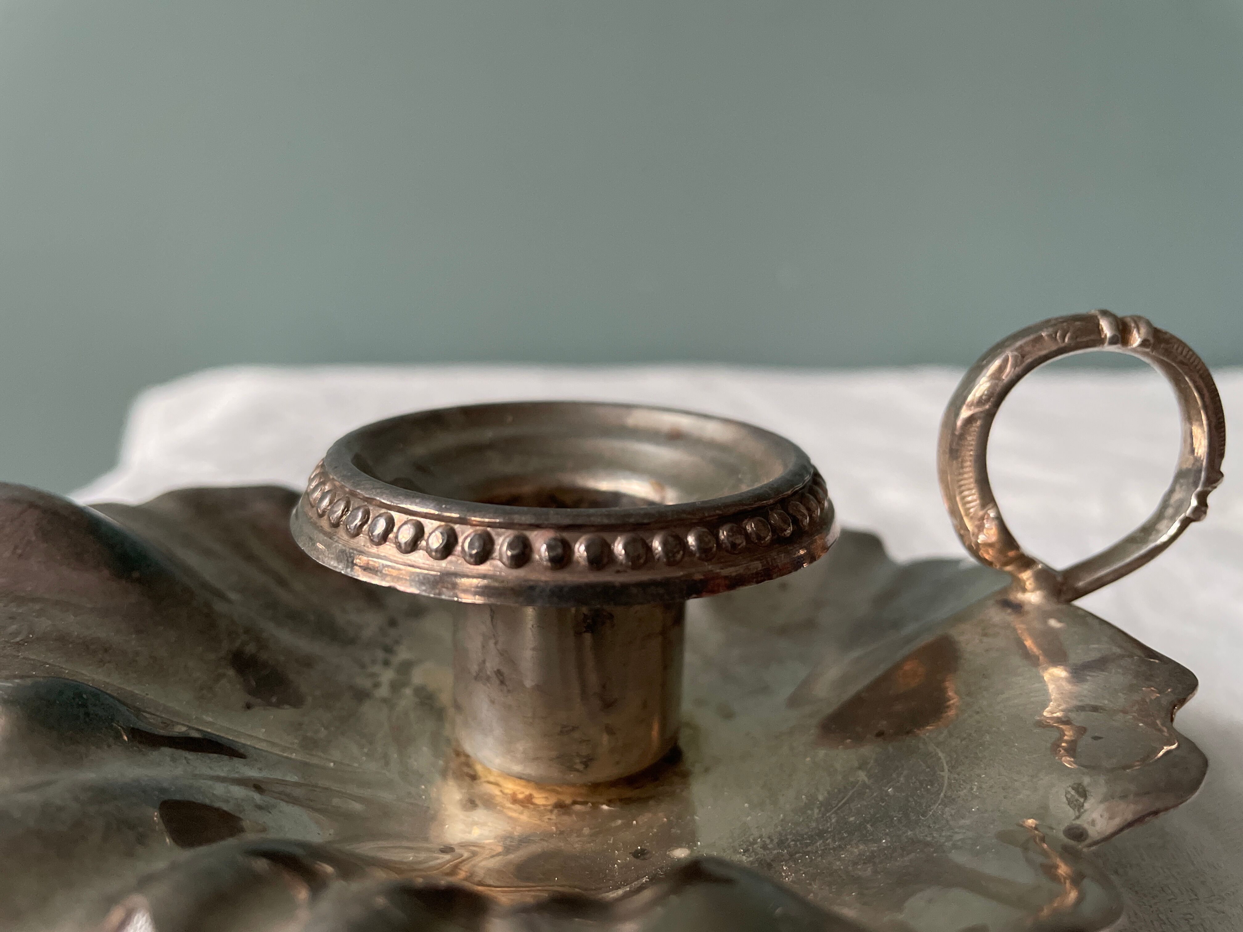 Old leaf-shaped hand candle holder, mid-twentieth