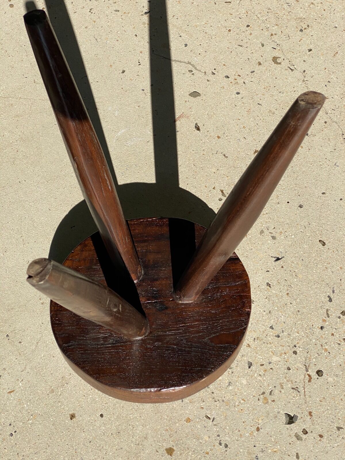 Brown solid wood stool seated circular dug