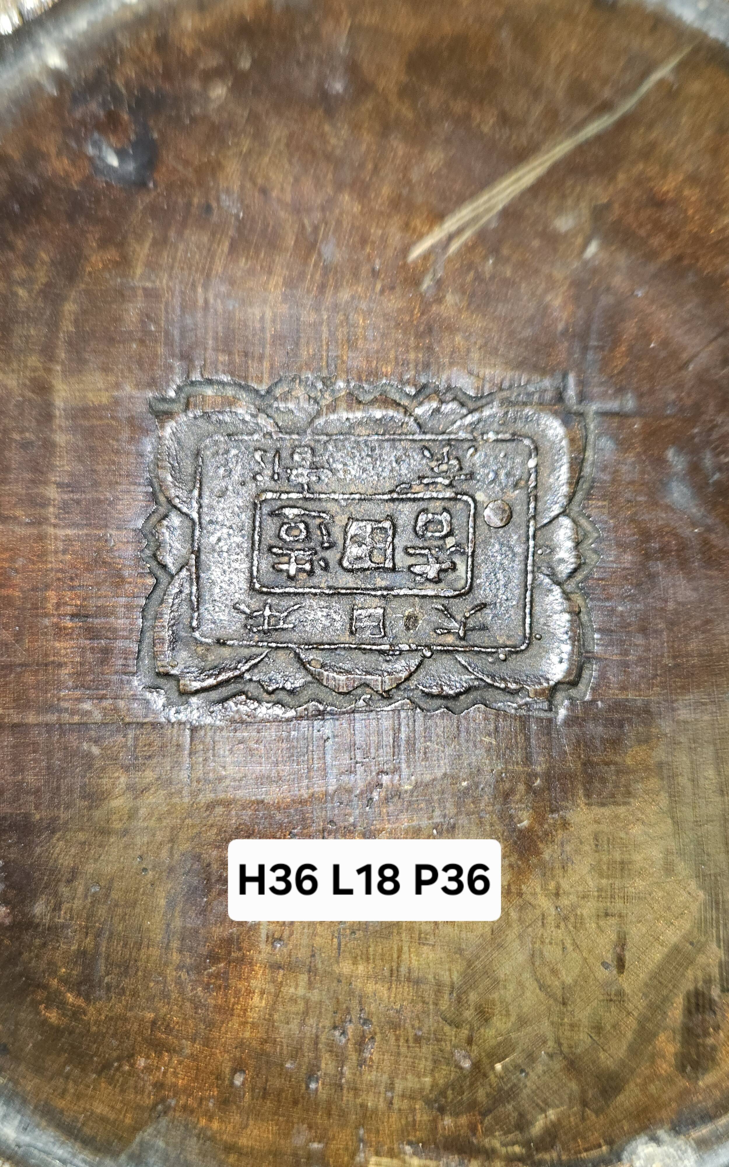 Patinated bronze vase with relief decoration