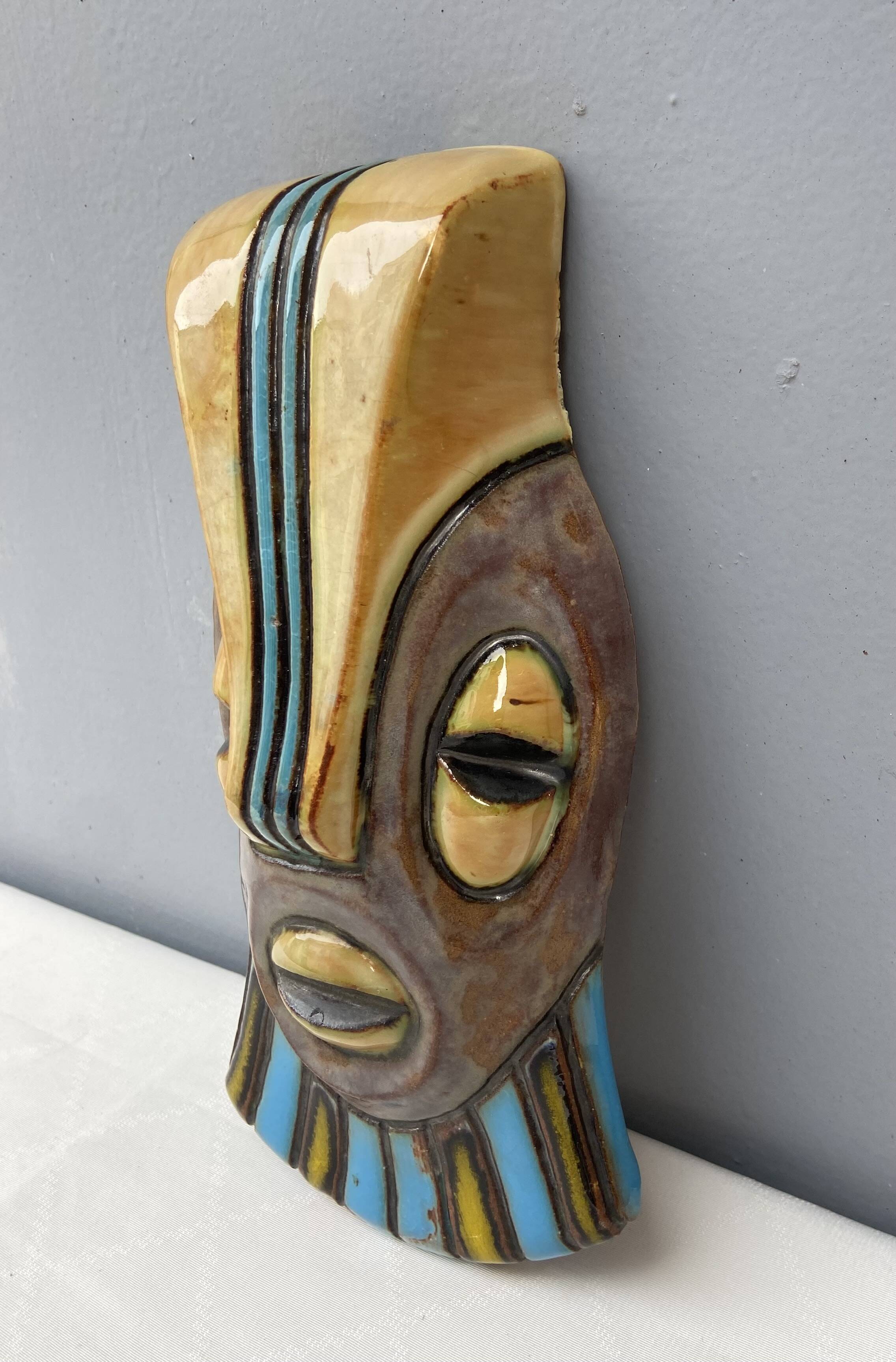 Masque africain en céramique