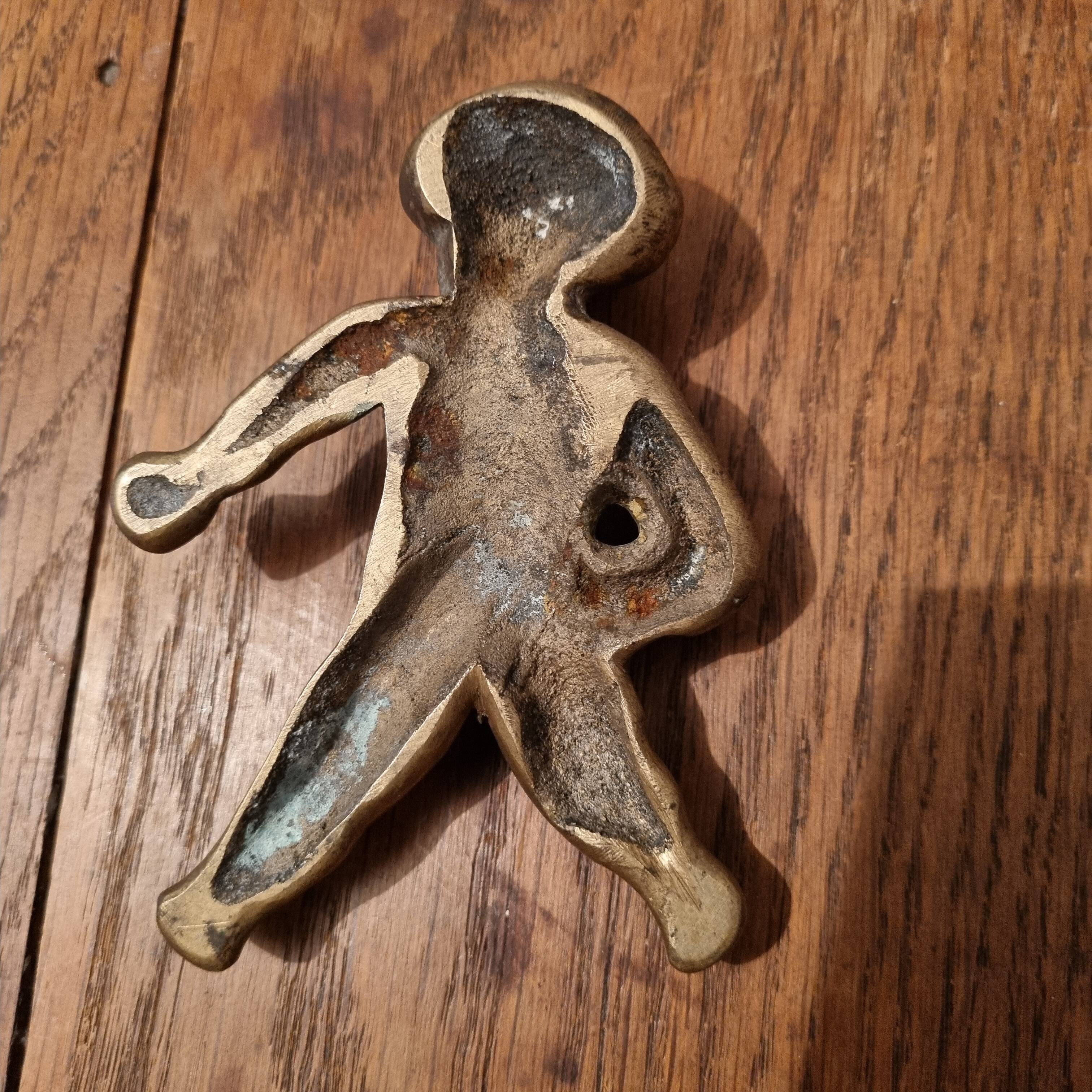 Rare bronze child statuette with blue eyes