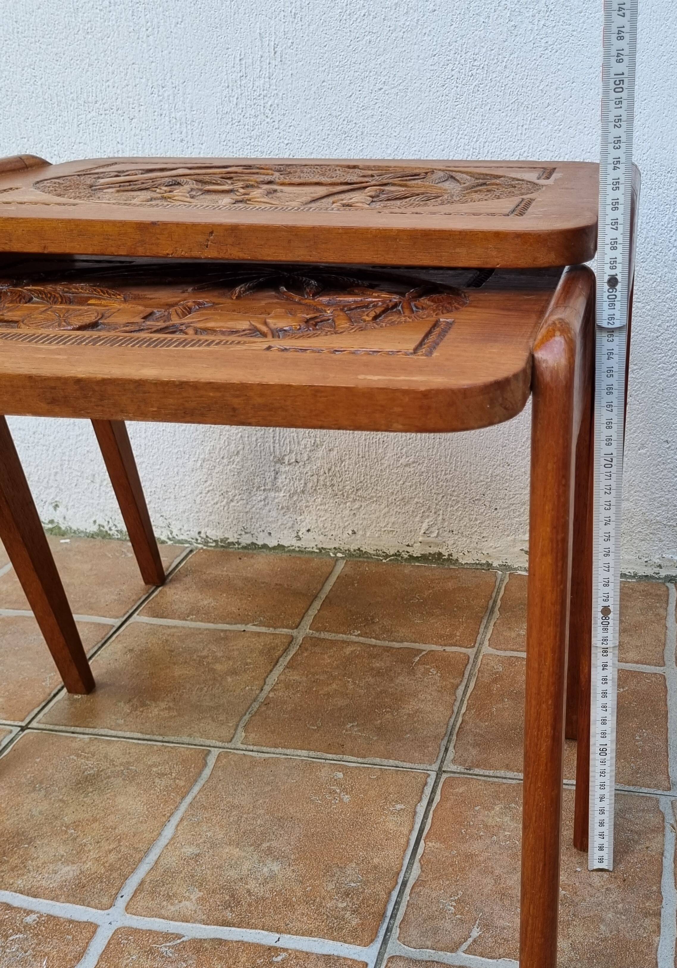 Pair of Malagasy nesting tables in carved wood, signed, m.o.f, 1955