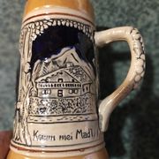 Two pitchers and a small original king beer mug