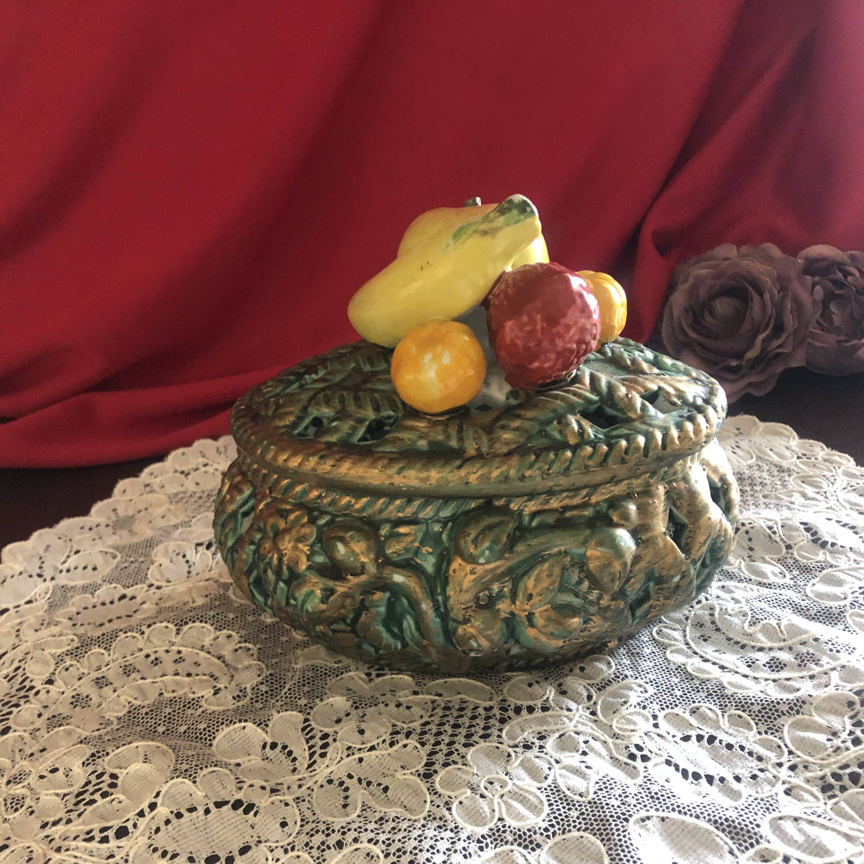 Openwork earthenware candy box with fruit slip
