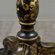 Table pliante Napoléon III en bois laqué noir et décor doré, XIXe siècle