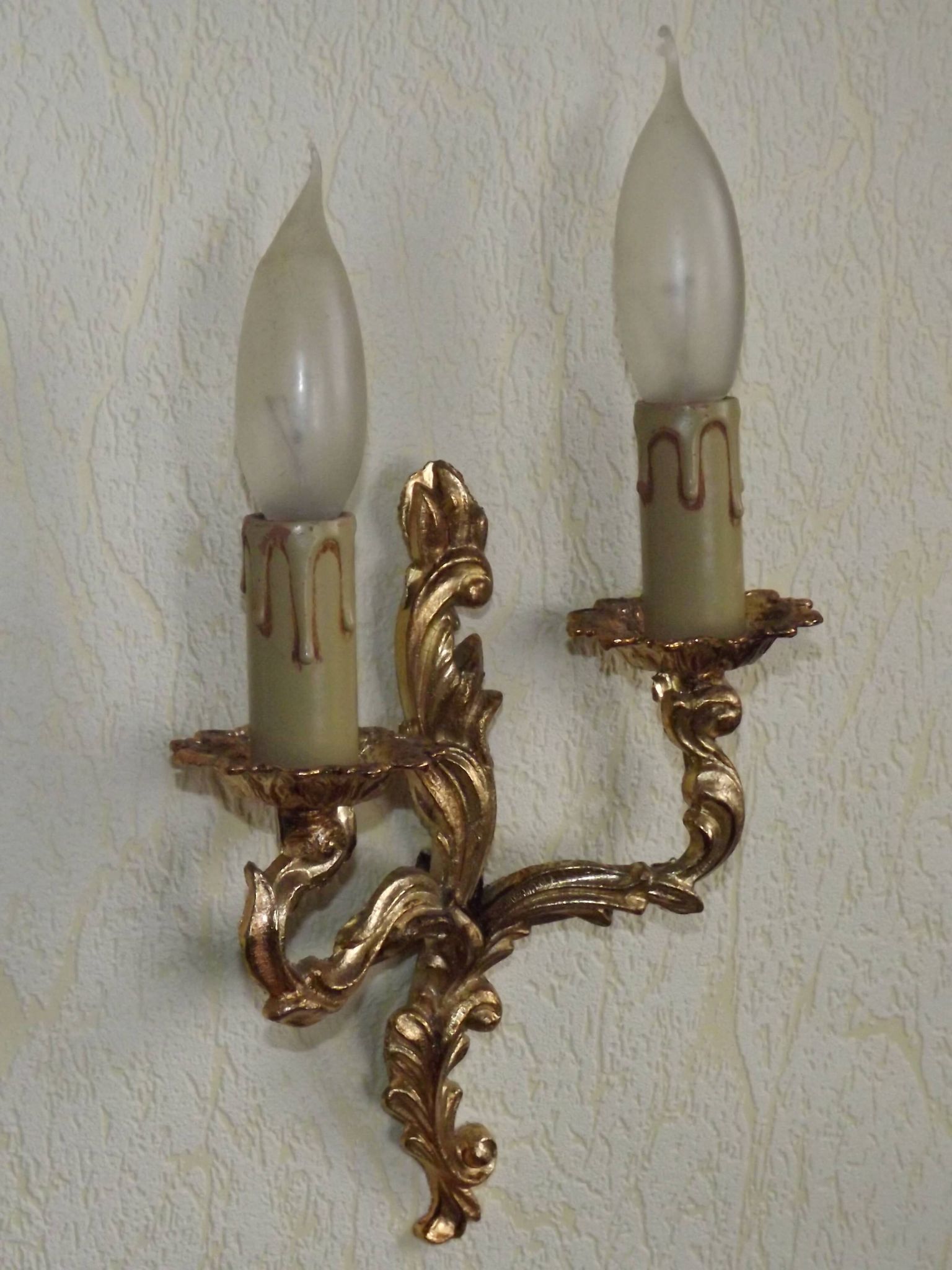 Brass wall lights.