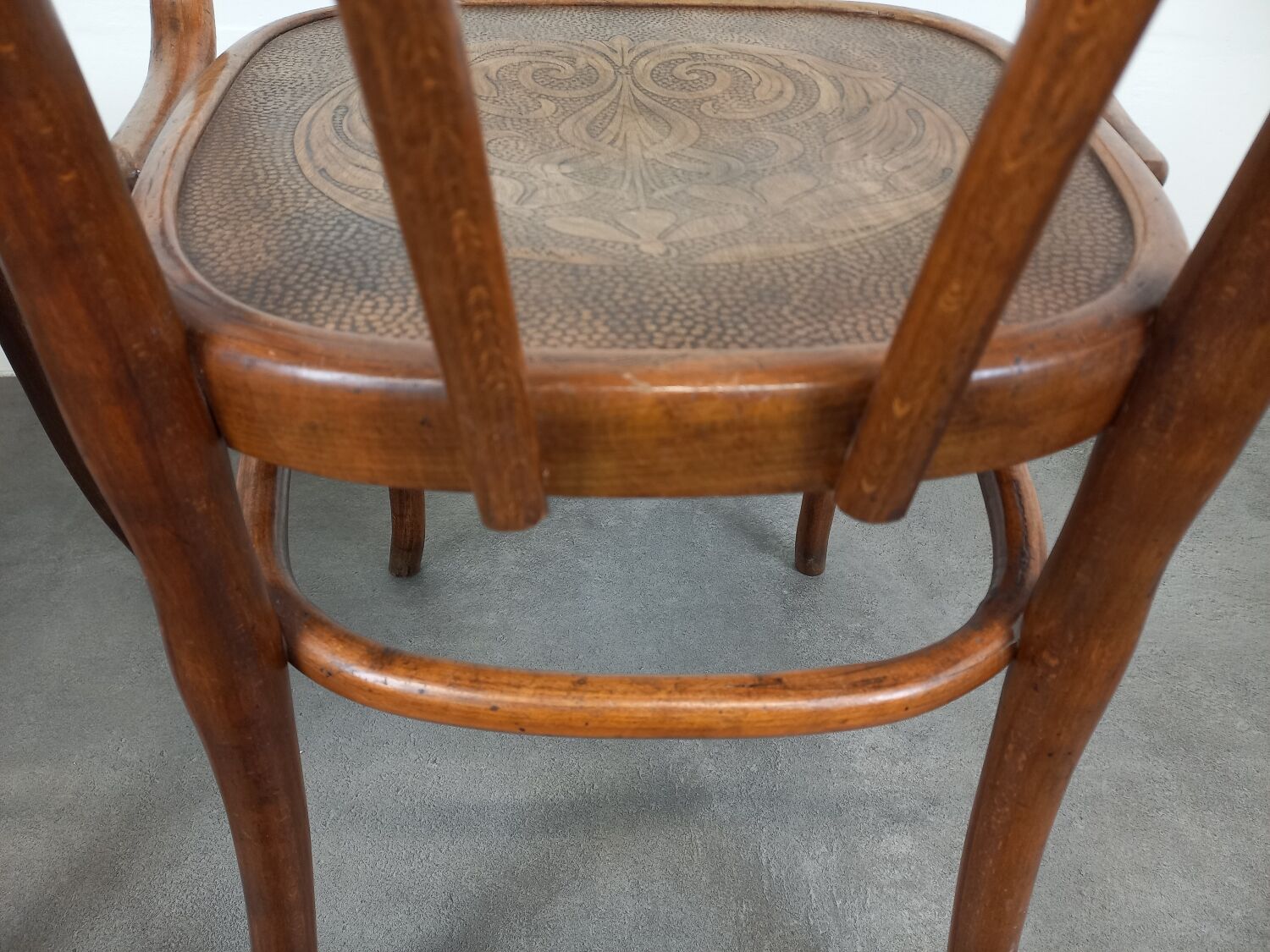 Pair of curved wooden bistro armchairs