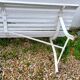 Old garden bench with metal legs and wooden slats