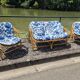 Rattan lounge with two armchairs and a vintage 1950s bench.