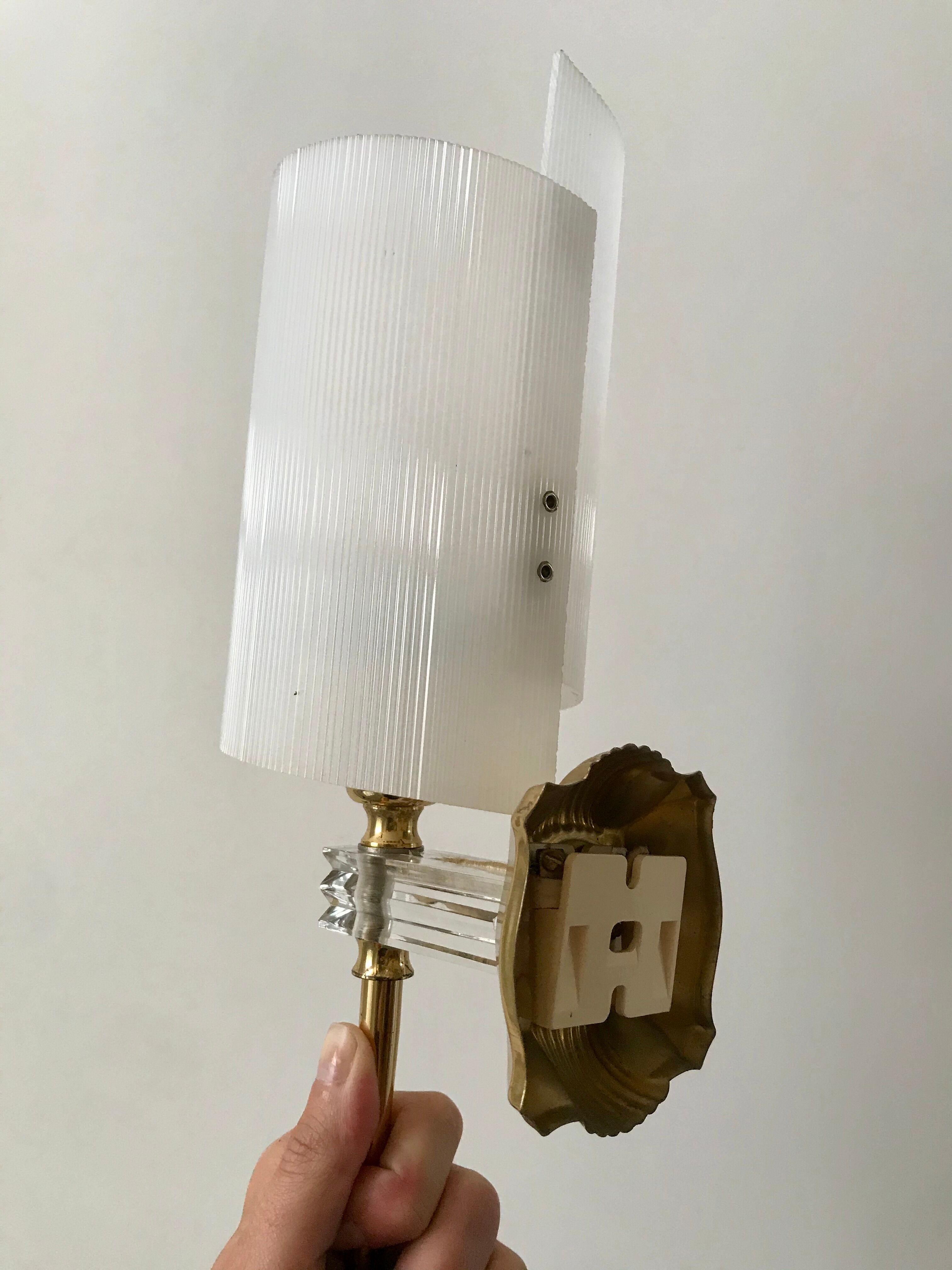 Pair of gold steel wall lamps, plexi and pleated plastic shades 60s-70s