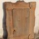 Tramp Art mirror from the 19th century in hand-carved wood.