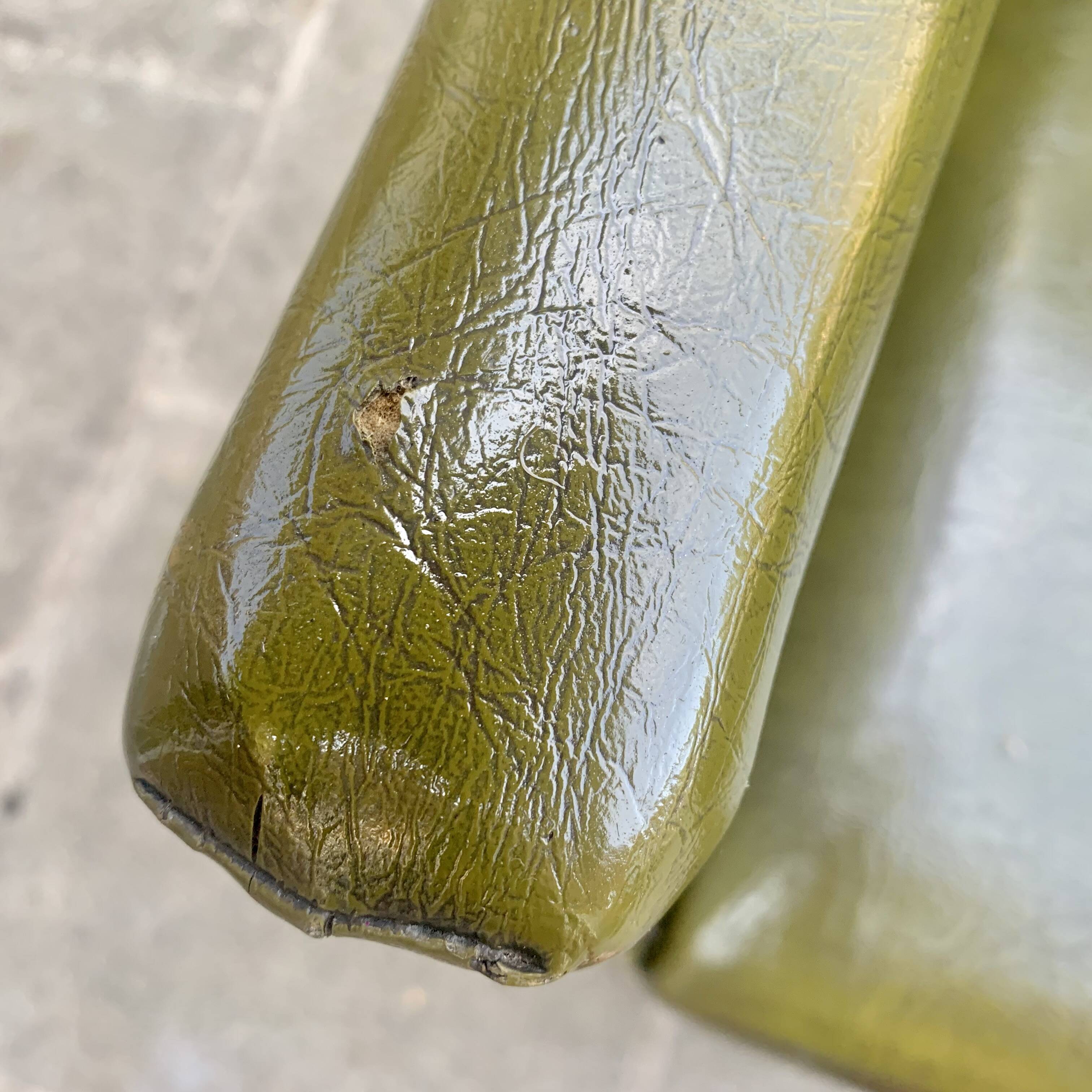 Vintage children's armchair in green skai