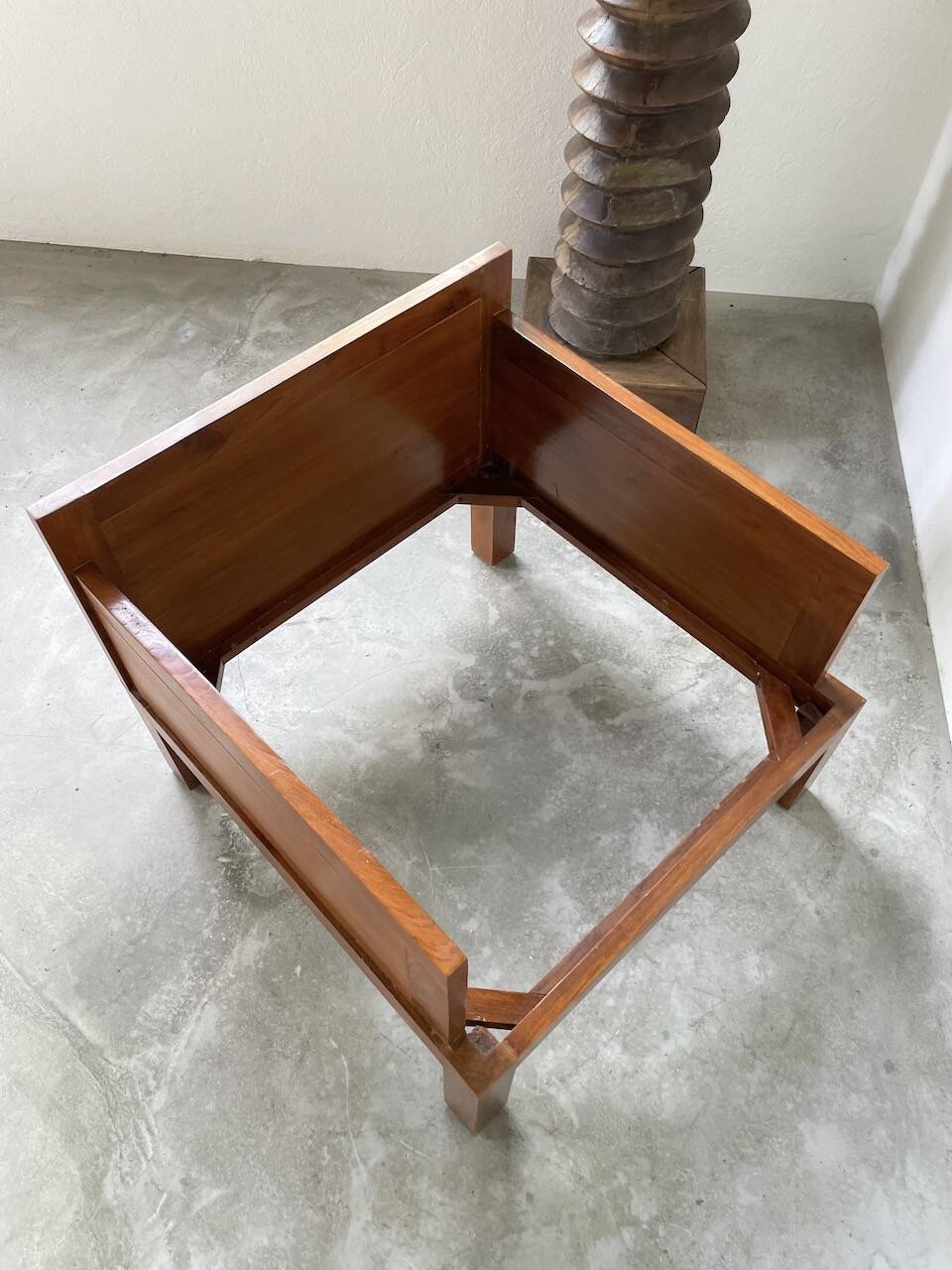Modernist armchair in exotic wood and leather