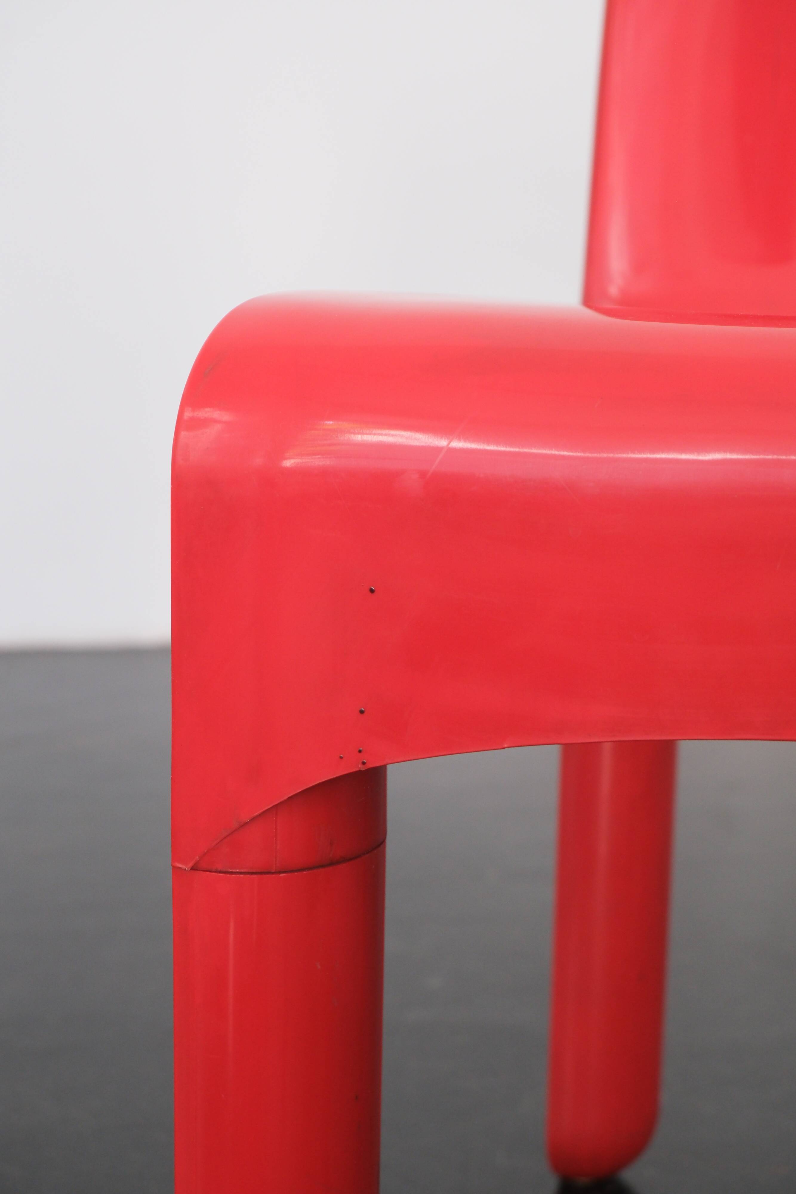 Red "Universale" chair by Joe Colombo / Kartell