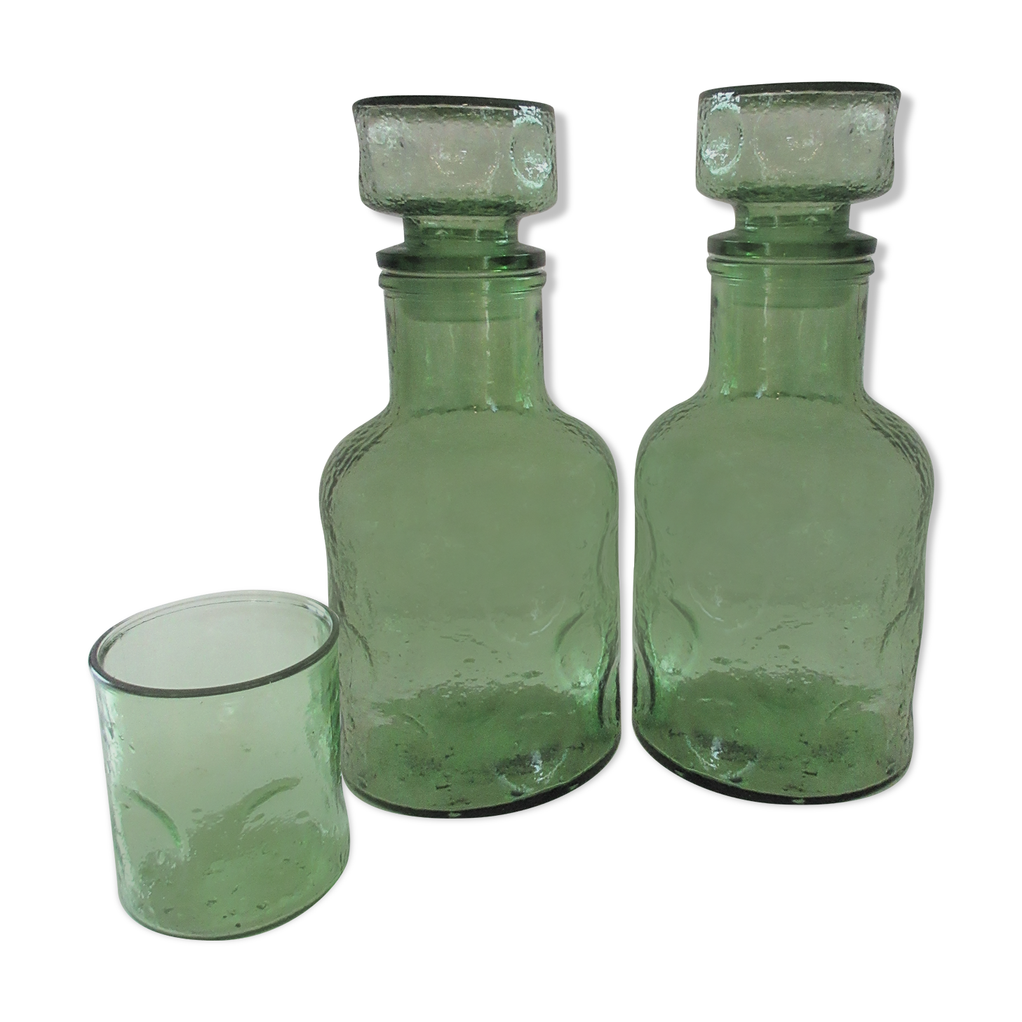 Pair of green decanters and glass