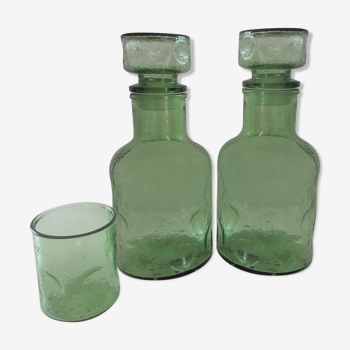 Pair of green decanters and glass