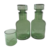 Pair of green decanters and glass