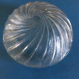 Small round glass globe in the shape of a spiral