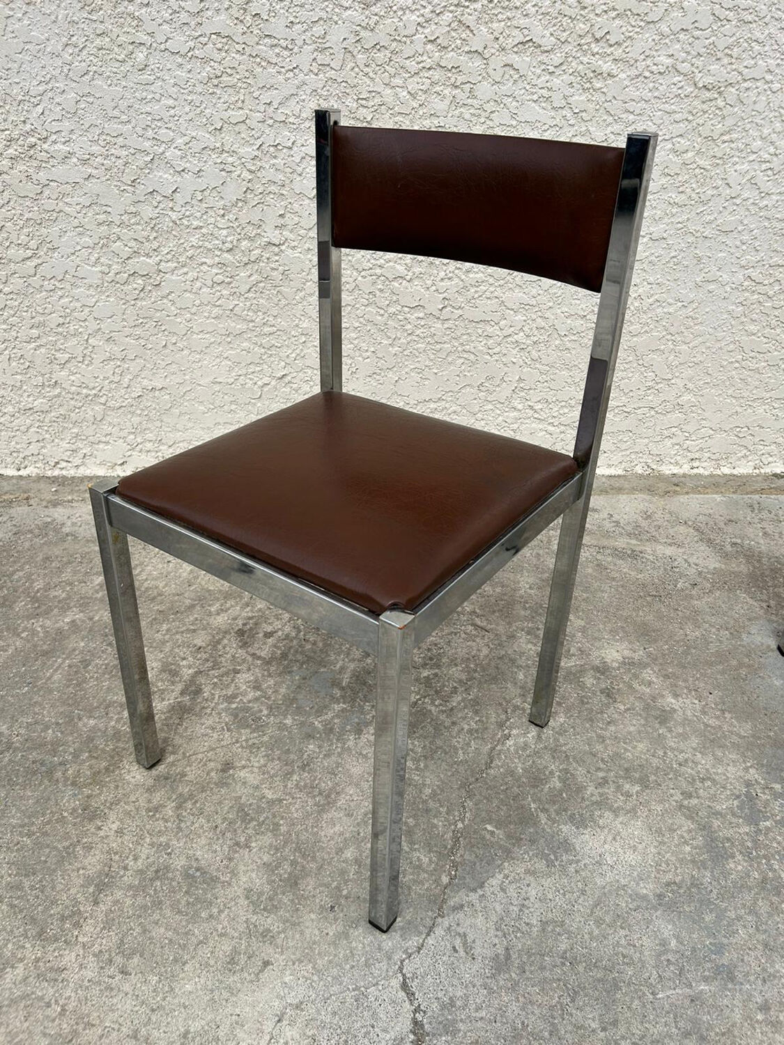 4 vintage leather/iron chairs