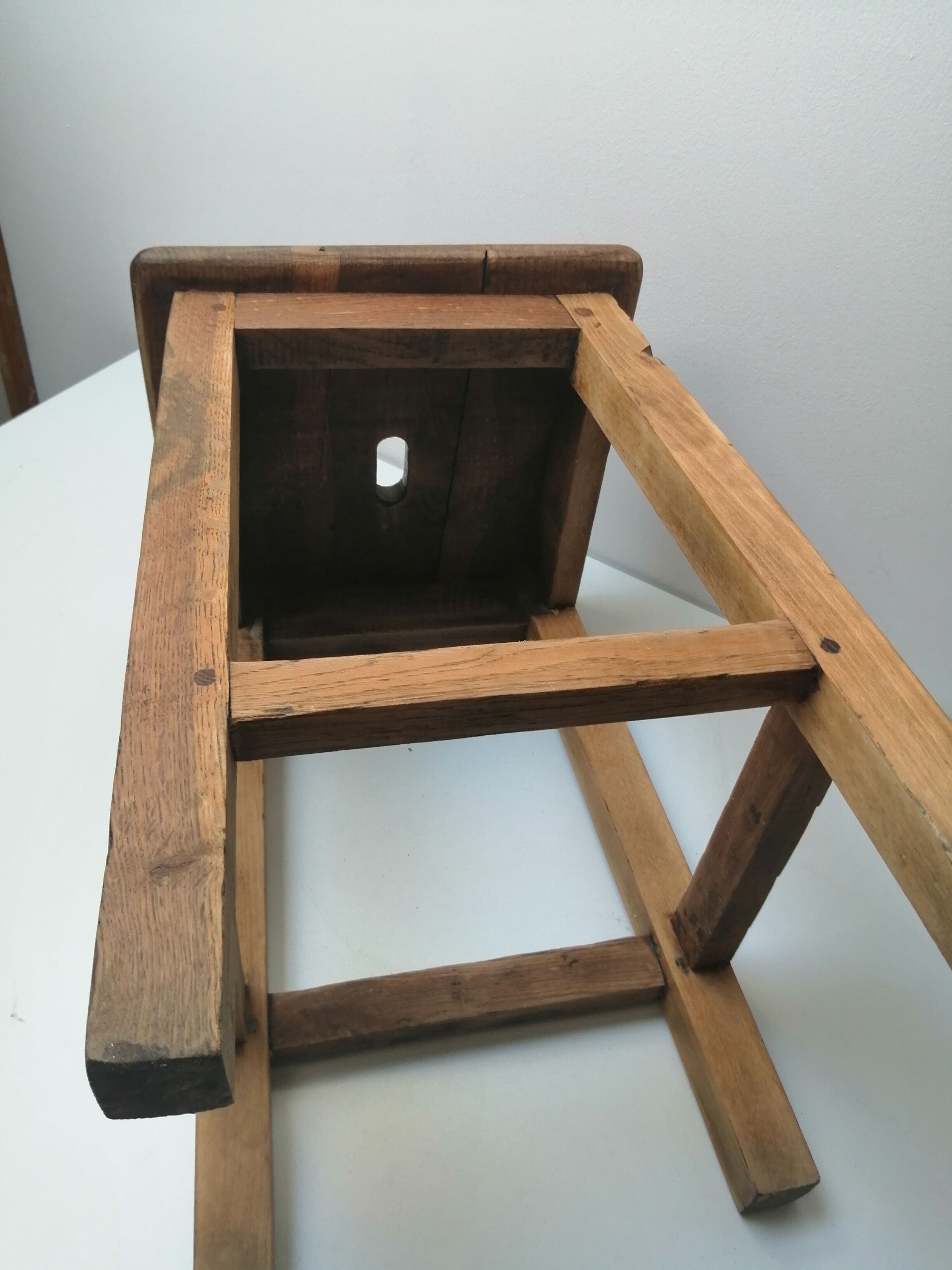 Old farm or workshop stool in oak