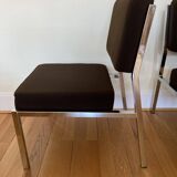 Pair of brown low chairs with chrome base