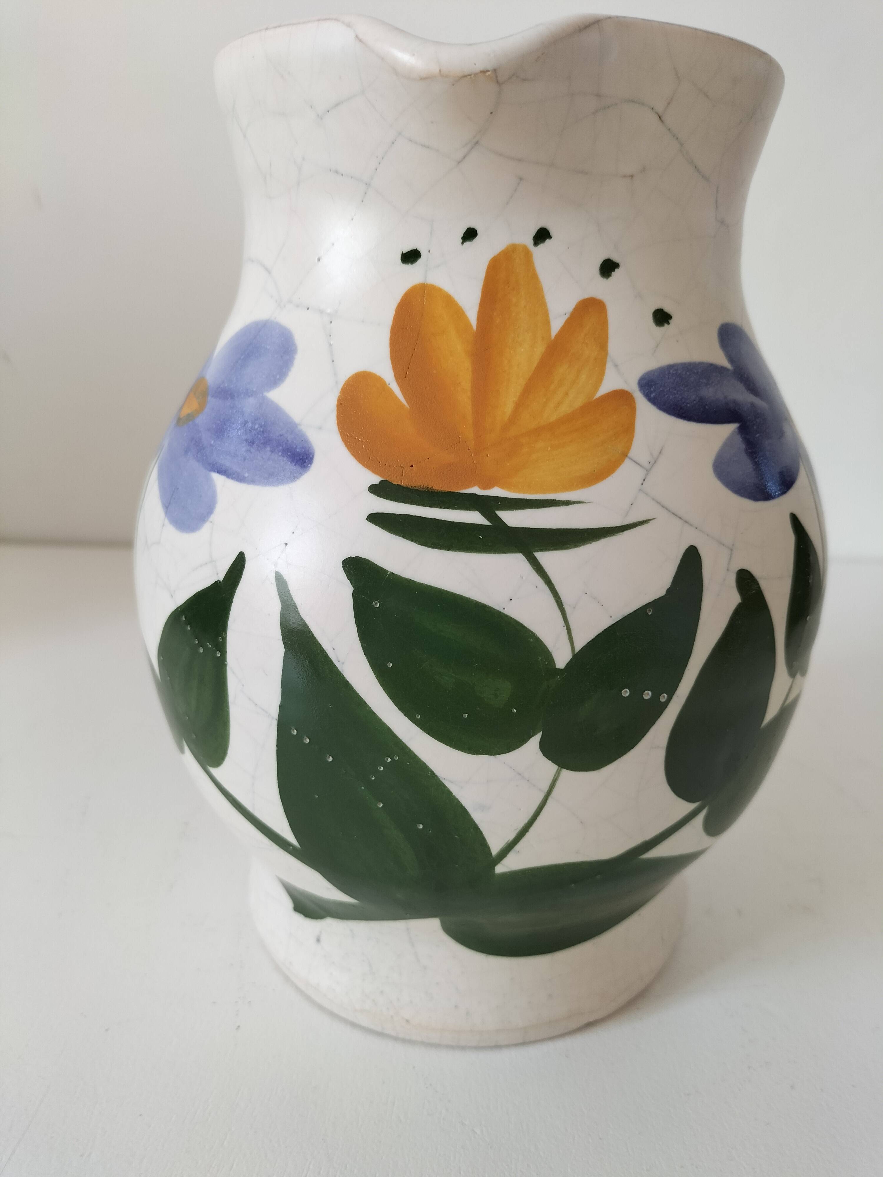 Vintage pitcher with floral decoration in the style of Poterie du Marais