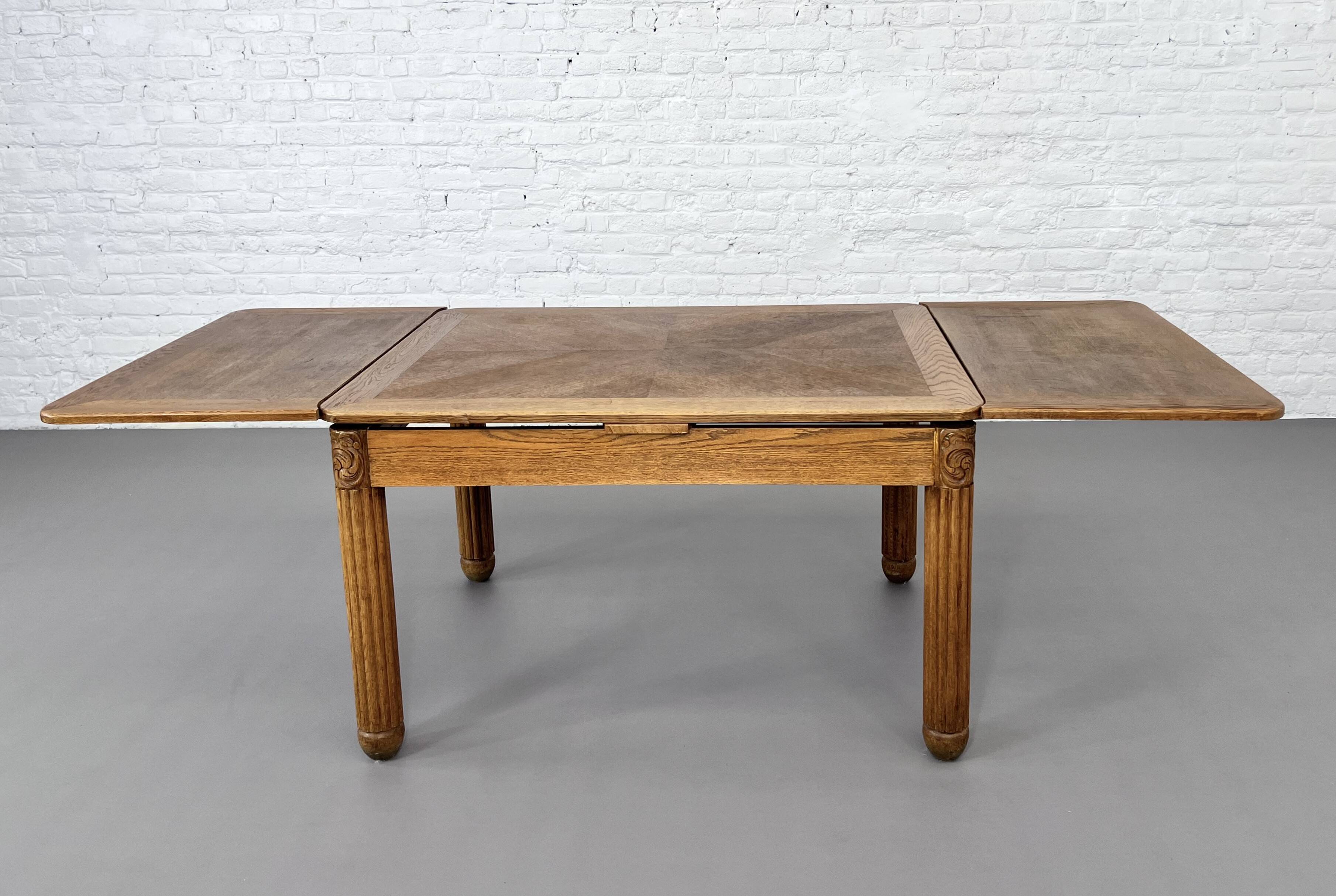 Rectangular dining table in oak and extendable early twentieth century