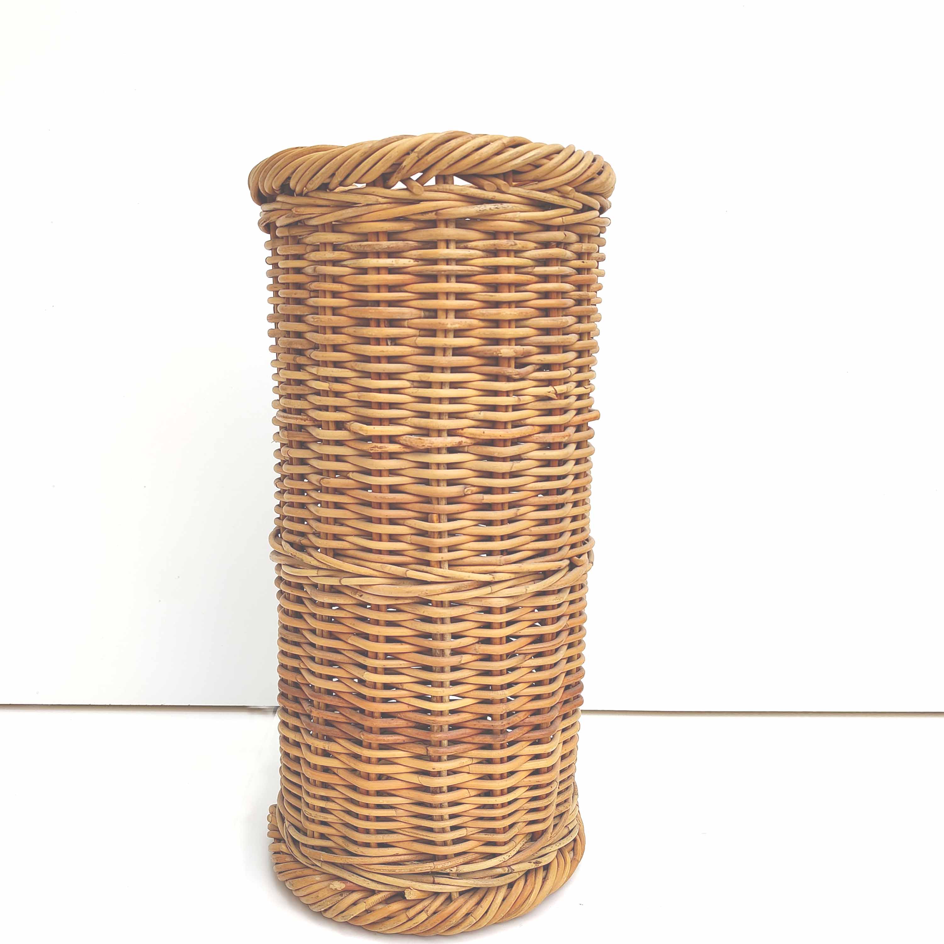 Vintage woven wicker umbrella holder