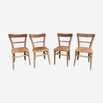Series of 4 chairs in vintage light wood beech