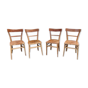 Series of 4 chairs in vintage light wood beech