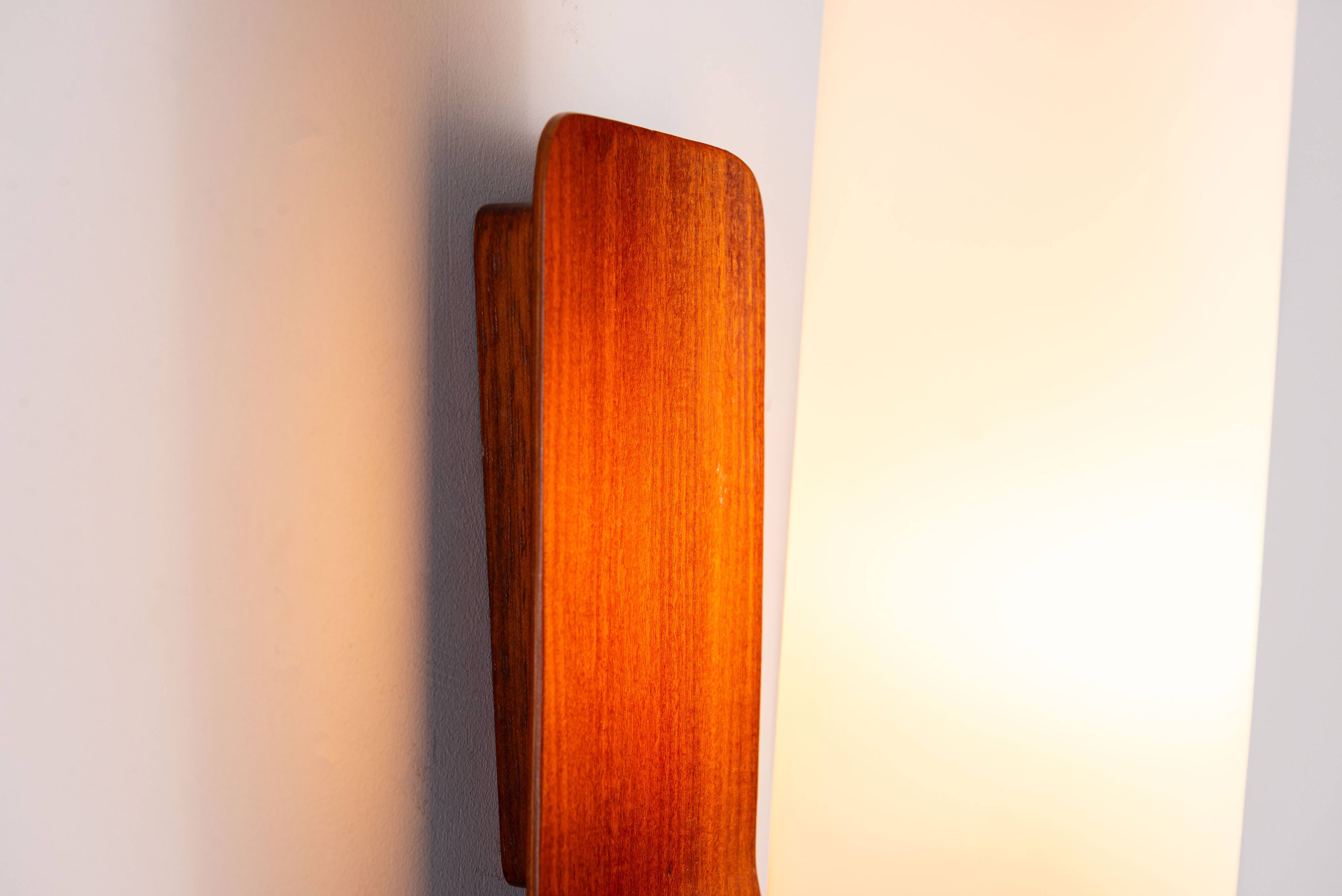Cilindrical opal glass and bent wood wall lamp