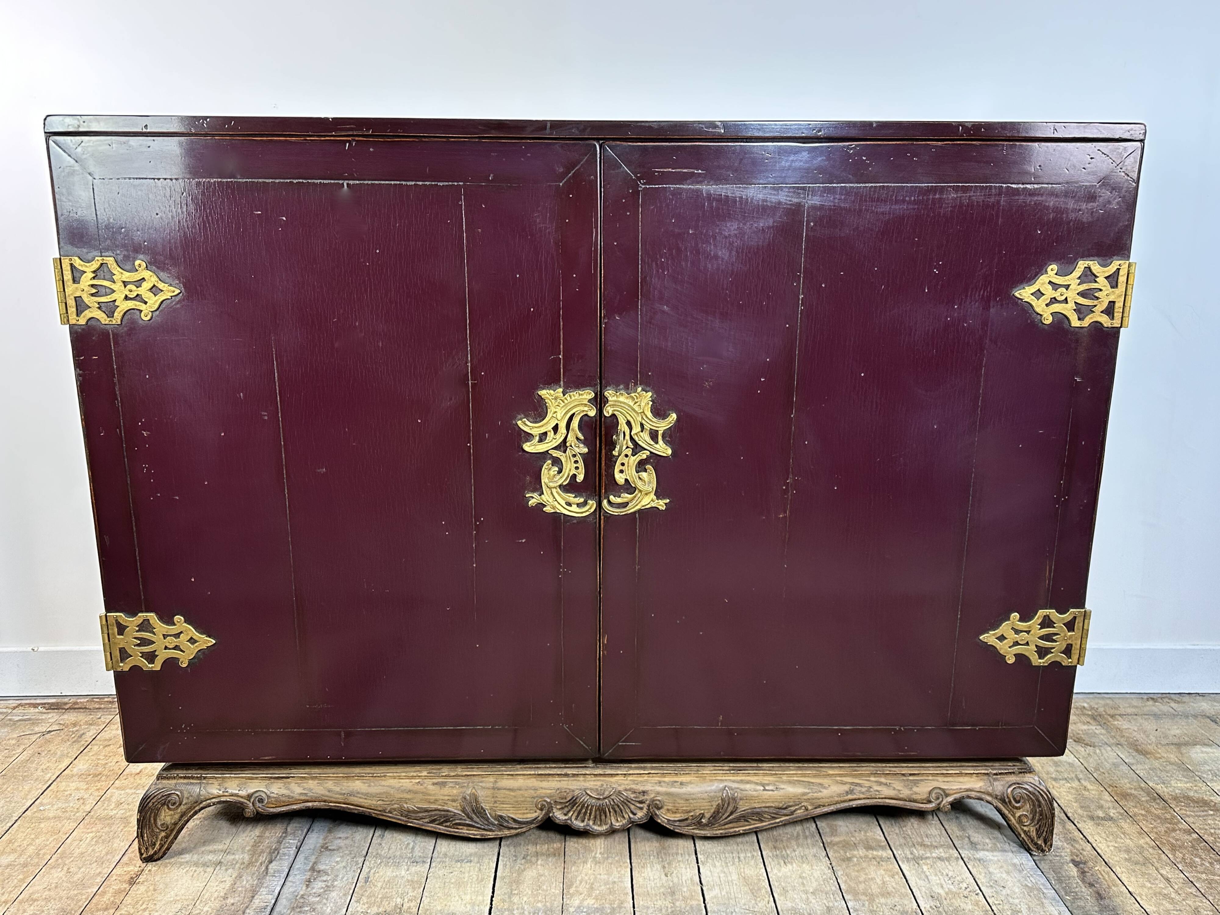 1950's lacquered wood and brass sideboard
