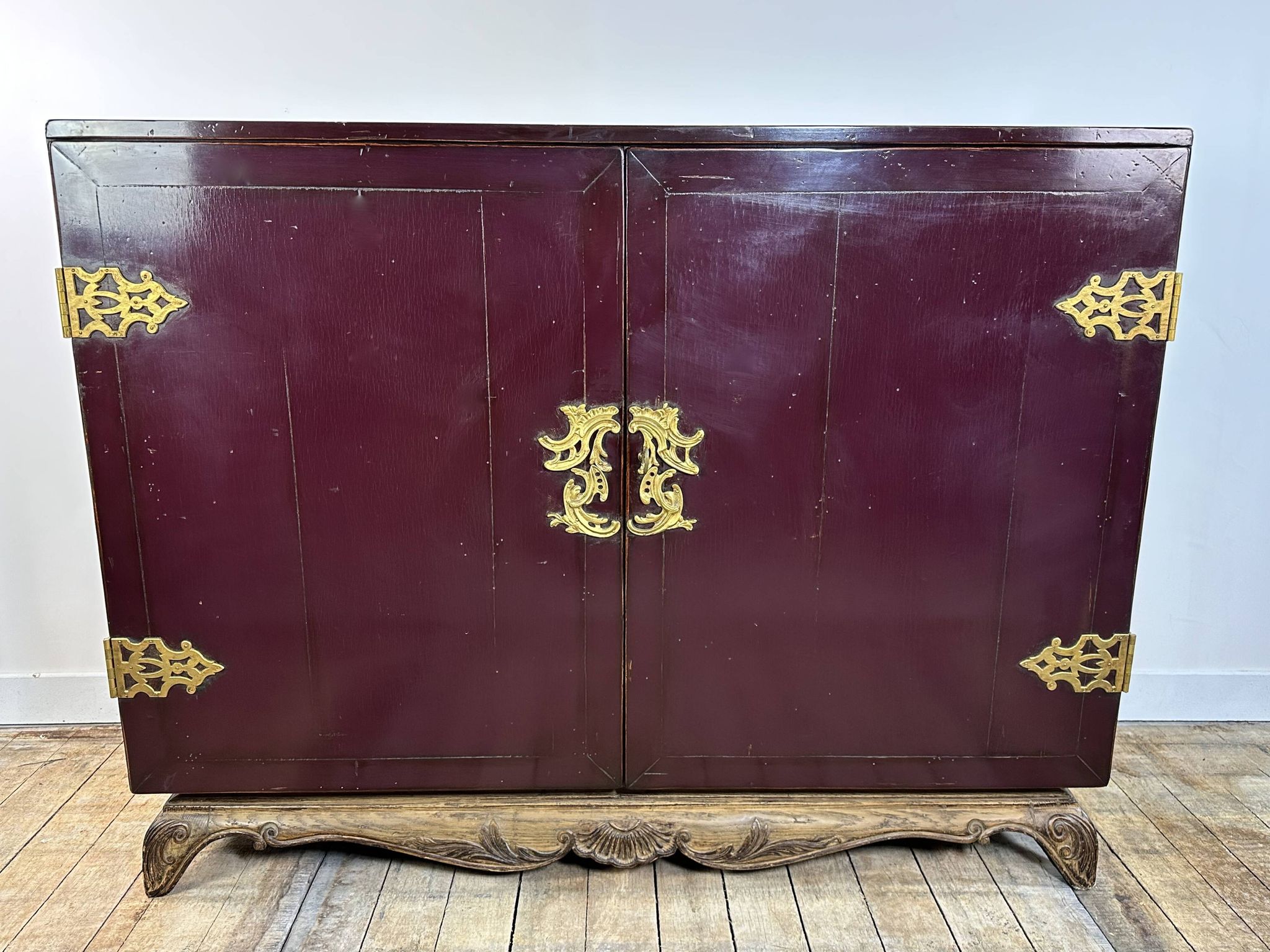 1950's lacquered wood and brass sideboard