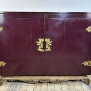 1950's lacquered wood and brass sideboard