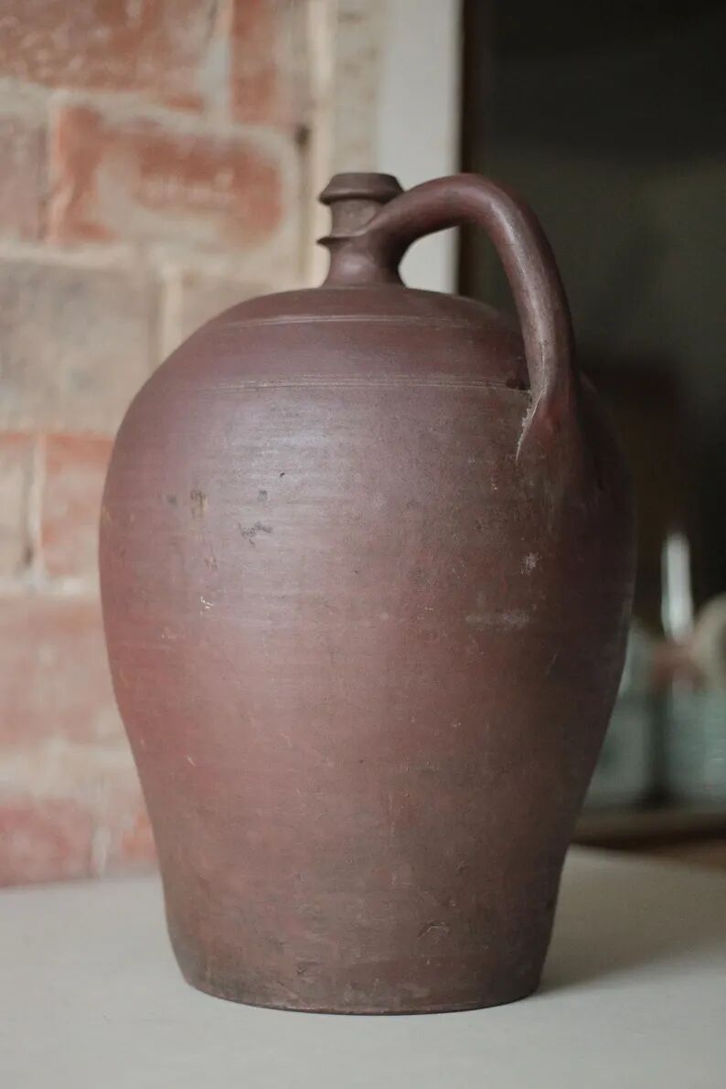 Old handled pot, antique pot, handled jar, interior decoration, collection, pottery.